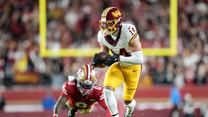 Oct 19, 2026; Santa Clara, California, USA;  Washington Commanders wide receiver Antonio Williams (14) makes a catch as San Francisco 49ers cornerback Renardo Green (0) defends during the fourth quarter at Levi's Stadium.  Mandatory Credit: Kyle Terada-Imagn Images
