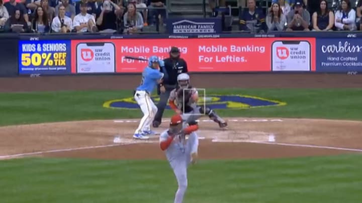 Cincinnati Reds relief pitcher Alexis Diaz pitches to Milwaukee Brewers outfielder Blake Perkins during the bottom of the ninth inning of Friday's 6-5 Reds win at American Family Field in Milwaukee, Wis. 
