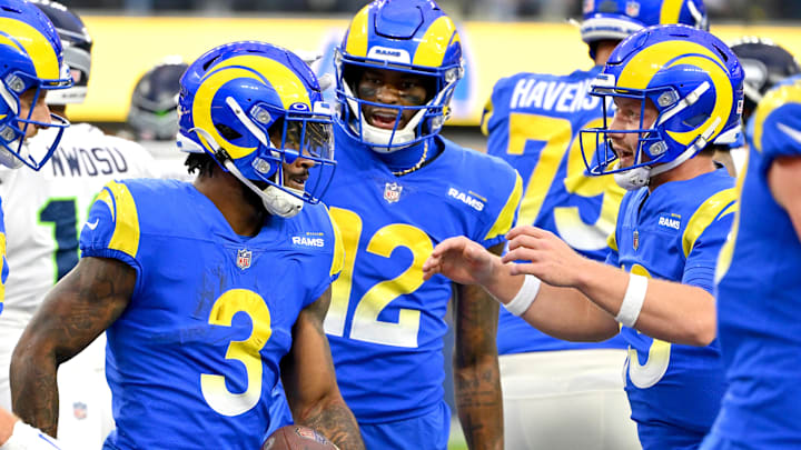 Dec 4, 2022; Inglewood, California, USA; Los Angeles Rams running back Cam Akers (3) is congratulated by wide receiver Van Jefferson (12) and quarterback John Wolford (13) after scoring a touchdown in the first half at SoFi Stadium. Mandatory Credit: Jayne Kamin-Oncea-Imagn Images