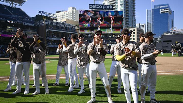 Sep 28, 2025; San Diego, California, USA; San Diego Padres players clap for the fans after the Padres beat the Arizona Diamondbacks at Petco Park. Mandatory Credit: Denis Poroy-Imagn Images Sep 28, 2025; San Diego, California, USA; San Diego Padres players clap for the fans after the Padres beat the Arizona Diamondbacks at Petco Park. Mandatory Credit: Denis Poroy-Imagn Images