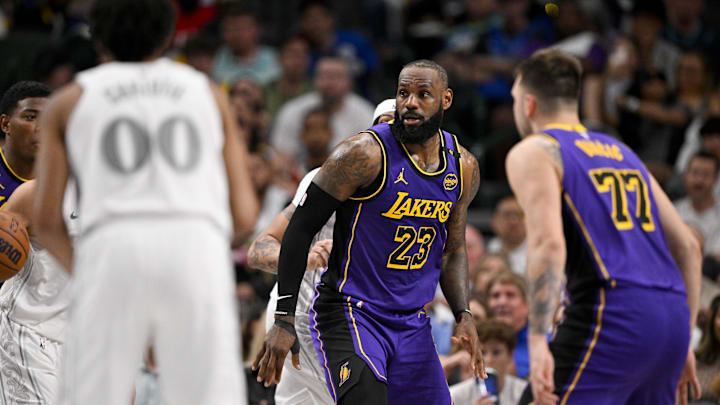 Apr 9, 2025; Dallas, Texas, USA; Los Angeles Lakers forward LeBron James (23) and guard Luka Doncic (77) in action during the game between the Dallas Mavericks and the Los Angeles Lakers at American Airlines Center. Mandatory Credit: Jerome Miron-Imagn Images