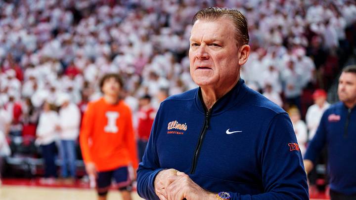 Feb 1, 2026; Lincoln, Nebraska, USA; Illinois Fighting Illini head coach Brad Underwood walks onto the court before the game against the Nebraska Cornhuskers at Pinnacle Bank Arena. Mandatory Credit: Dylan Widger-Imagn Images