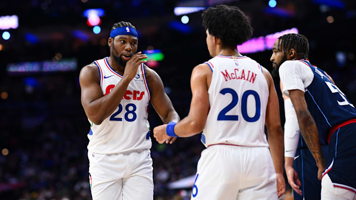 Nov 24, 2024; Philadelphia, Pennsylvania, USA; Philadelphia 76ers forward Guerschon Yabusele (28) reacts with guard Jared McCain (20) against the Los Angeles Clippers in the first quarter at Wells Fargo Center. Mandatory Credit: Kyle Ross-Imagn Images
