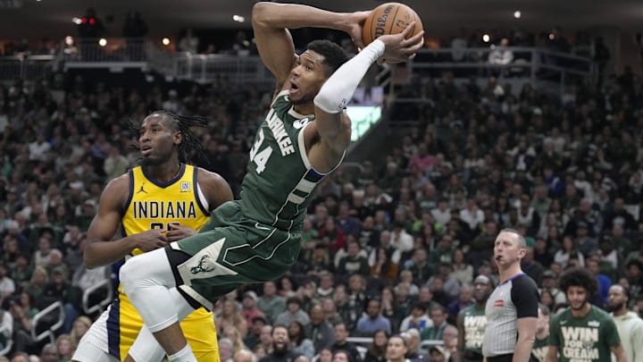 Apr 25, 2025; Milwaukee, Wisconsin, USA; Milwaukee Bucks forward Giannis Antetokounmpo (34) throws the ball in before going out of bounds against the Indiana Pacersduring game three of first round for the 2024 NBA Playoffs at Fiserv Forum. Mandatory Credit: Michael McLoone-Imagn Images