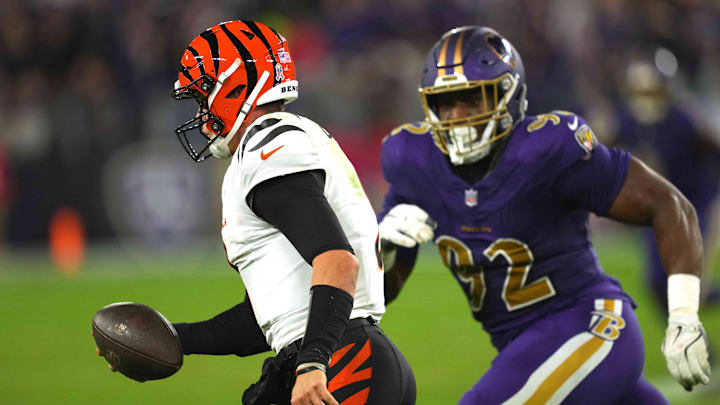 Nov 7, 2024; Baltimore, Maryland, USA; Cincinnati Bengals quarterback Joe Burrow (9) pressured by Baltimore Ravens Nnamdi Madubuike (92) during the second quarter at M&T Bank Stadium. Mandatory Credit: Mitch Stringer-Imagn Images Nov 7, 2024; Baltimore, Maryland, USA; Cincinnati Bengals quarterback Joe Burrow (9) pressured by Baltimore Ravens Nnamdi Madubuike (92) during the second quarter at M&T Bank Stadium. Mandatory Credit: Mitch Stringer-Imagn Images