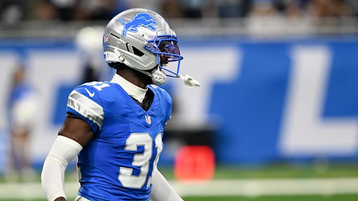 Sep 14, 2025; Detroit, Michigan, USA; Detroit Lions safety Kerby Joseph (31) celebrates after an interception against the Chicago Bears during the second quarter of the game at Ford Field. Mandatory Credit: Lon Horwedel-Imagn Images