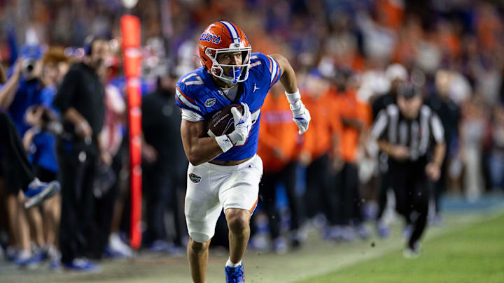 Oct 19, 2024; Gainesville, Florida, USA; Florida Gators wide receiver Chimere Dike (17) runs with the ball against the Kentucky Wildcats during the second half at Ben Hill Griffin Stadium. Mandatory Credit: Matt Pendleton-Imagn Images Oct 19, 2024; Gainesville, Florida, USA; Florida Gators wide receiver Chimere Dike (17) runs with the ball against the Kentucky Wildcats during the second half at Ben Hill Griffin Stadium. Mandatory Credit: Matt Pendleton-Imagn Images