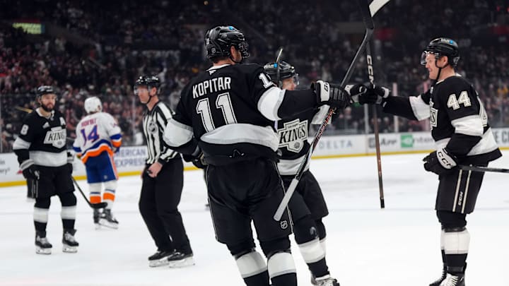 Mar 5, 2026; Los Angeles, California, USA; LA Kings center Anze Kopitar (11) and defenseman Mikey Anderson (44)] celebrate after a goal against the New York Islanders in the second period at Crypto.com Arena. Mandatory Credit: Kirby Lee-Imagn Images