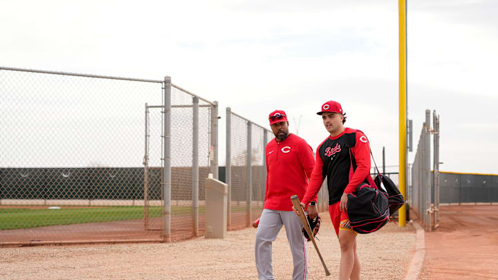 Cincinnati Reds non-roster invitee Sal Stewart walks with Barry Larkin between fields at the Cincinnati Reds Player Development Complex in Goodyear, Ariz., on Wednesday, Feb. 12, 2025. Cincinnati Reds non-roster invitee Sal Stewart walks with Barry Larkin between fields at the Cincinnati Reds Player Development Complex in Goodyear, Ariz., on Wednesday, Feb. 12, 2025.