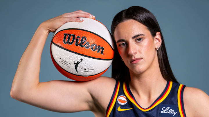 Indiana Fever guard Caitlin Clark (22) poses for a photo Wednesday, April 22, 2026, during media day at Gainbridge Fieldhouse in Indianapolis.