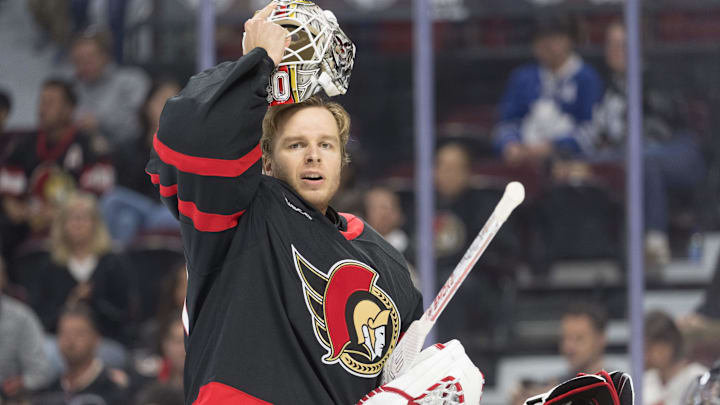 Sep 21st, 2025; Ottawa, Ontario, CAN; Ottawa Senators goalie Mads Sogaard (40) dons his facemask in the second period against the Toronto Maple Leafs at the Canadian Tire Centre. Mandatory Credit: Marc DesRosiers-IMAGN Images