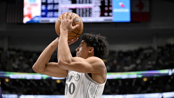 Feb 21, 2025; Dallas, Texas, USA; Dallas Mavericks guard Max Christie (00) makes a jump shot against the New Orleans Pelicans during the second half at the American Airlines Center. Mandatory Credit: Jerome Miron-Imagn Images