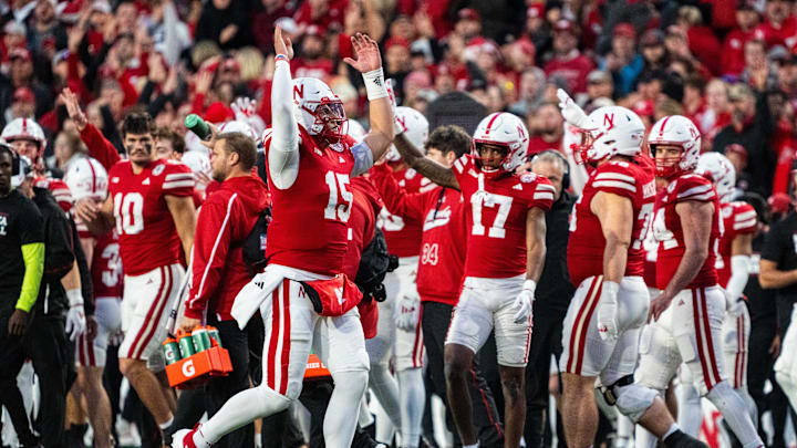 Nov 23, 2024; Lincoln, Nebraska, USA; Nebraska Cornhuskers quarterback Dylan Raiola (15) hypes up the crowd at the end of the third quarter against the Wisconsin Badgers at Memorial Stadium. Mandatory Credit: Dylan Widger-Imagn Images