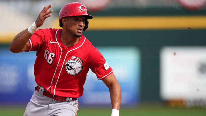 Cincinnati Reds outfielder Bubba Thompson rounds third base in the sixth inning during a MLB spring training baseball game against the Cleveland Guardians at Goodyear Ballpark.