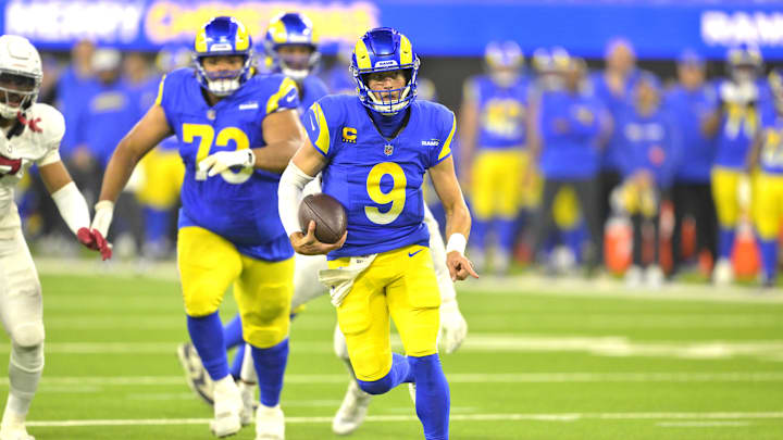 Dec 28, 2024; Inglewood, California, USA;   Los Angeles Rams quarterback Matthew Stafford (9) carries the ball to the 5-yard line in the first half against the Arizona Cardinals at SoFi Stadium. Mandatory Credit: Jayne Kamin-Oncea-Imagn Images