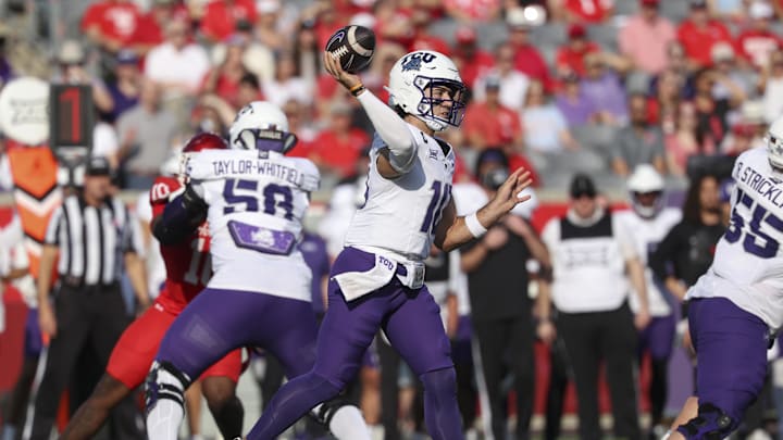 Nov 22, 2025; Houston, Texas, USA; TCU Horned Frogs quarterback Josh Hoover (10) passes the ball during the first quarter against the Houston Cougars at TDECU Stadium. Mandatory Credit: Troy Taormina-Imagn Images Nov 22, 2025; Houston, Texas, USA; TCU Horned Frogs quarterback Josh Hoover (10) passes the ball during the first quarter against the Houston Cougars at TDECU Stadium. Mandatory Credit: Troy Taormina-Imagn Images