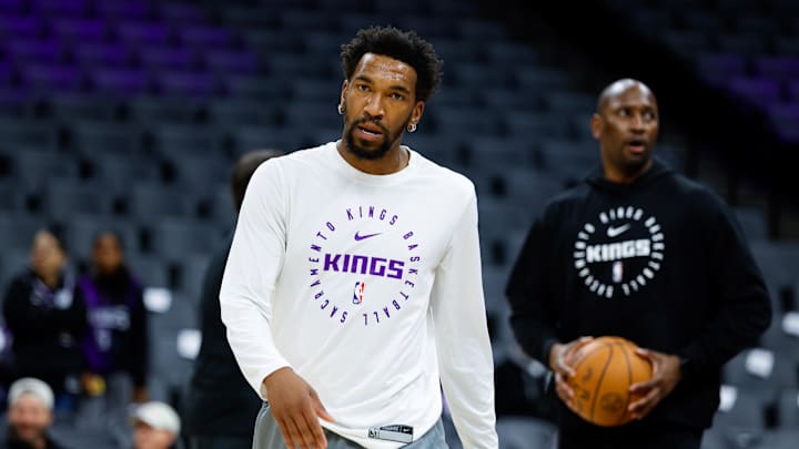 Mar 17, 2025; Sacramento, California, USA; Sacramento Kings guard Malik Monk (0) warms up before a game against the Portland Trail Blazers at Golden 1 Center. Mandatory Credit: Sergio Estrada-Imagn Images