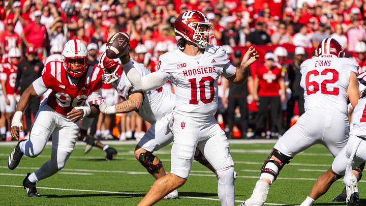 Oct 10, 2026; Lincoln, Nebraska, USA; Indiana Hoosiers quarterback Josh Hoover (10) passes against the Nebraska Cornhuskers during the first quarter at Memorial Stadium. Credit: Dylan Widger- Oct 10, 2026; Lincoln, Nebraska, USA; Indiana Hoosiers quarterback Josh Hoover (10) passes against the Nebraska Cornhuskers during the first quarter at Memorial Stadium. Credit: Dylan Widger-
