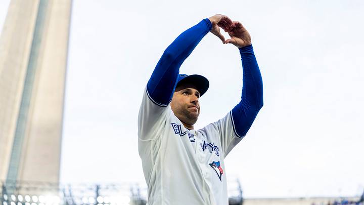 Sep 27, 2026; Toronto, Ontario, CAN;  Toronto Blue Jays designated hitter George Springer (4) makes a heart shape with his hands to salute the fans after defeating the Cincinnati Reds at Rogers Centre.  Mandatory Credit: Kevin Sousa-Imagn Images