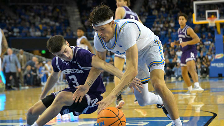 Jan 24, 2026; Los Angeles, California, USA;  Northwestern Wildcats guard Jake West (3) and UCLA Bruins guard Jamar Brown (4) reach for a loose ball in the second half at Pauley Pavilion presented by Wescom Financial. Mandatory Credit: Jayne Kamin-Oncea-Imagn Images
