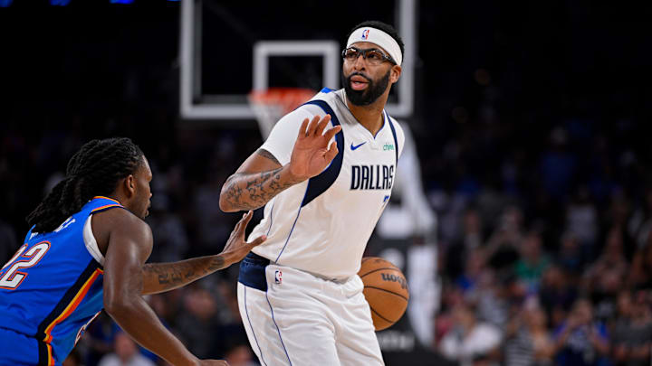 Oct 6, 2025; Fort Worth, Texas, USA; Dallas Mavericks forward/center Anthony Davis (3) sets the play against Oklahoma City Thunder guard Cason Wallace (22) during the game between the Dallas Mavericks and the Oklahoma City Thunder at Dickie's Arena. Mandatory Credit: Jerome Miron-Imagn Images