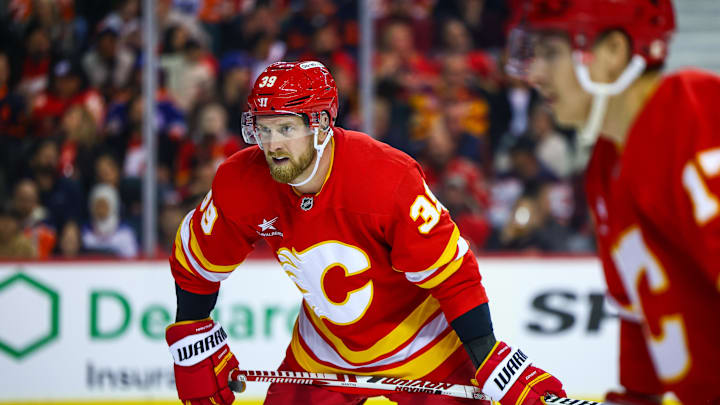 Nov 3, 2024; Calgary, Alberta, CAN; Calgary Flames right wing Anthony Mantha (39) during the face off against the Edmonton Oilers during the second period at Scotiabank Saddledome. Mandatory Credit: Sergei Belski-Imagn Images