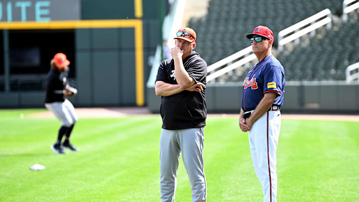 Mar 5, 2024; North Port, Florida, USA; Atlanta Braves manager Brian Snitker (43) and Detroit Tigers