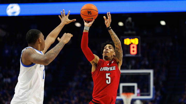Dec 14, 2024; Lexington, Kentucky, USA; Louisville Cardinals guard Terrence Edwards Jr. (5) shoots the ball during the first half against the Kentucky Wildcats at Rupp Arena at Central Bank Center. Mandatory Credit: Jordan Prather-Imagn Images