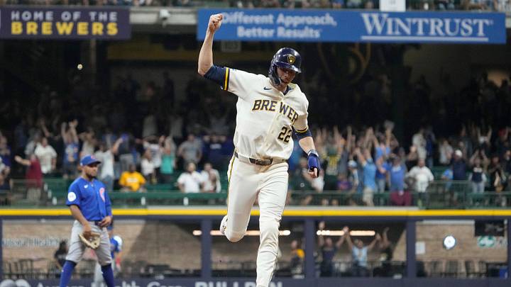 Sep 8, 2026; Milwaukee, Wisconsin, USA; Milwaukee Brewers designated hitter Christian Yelich (22) celebrates as Milwaukee Brewers left fielder Jackson Chourio (11) (not pictured) hits a two run home run to tie the game against the Chicago Cubs in the ninth inning at American Family Field. Mandatory Credit: Michael McLoone-Imagn Images Sep 8, 2026; Milwaukee, Wisconsin, USA; Milwaukee Brewers designated hitter Christian Yelich (22) celebrates as Milwaukee Brewers left fielder Jackson Chourio (11) (not pictured) hits a two run home run to tie the game against the Chicago Cubs in the ninth inning at American Family Field. Mandatory Credit: Michael McLoone-Imagn Images
