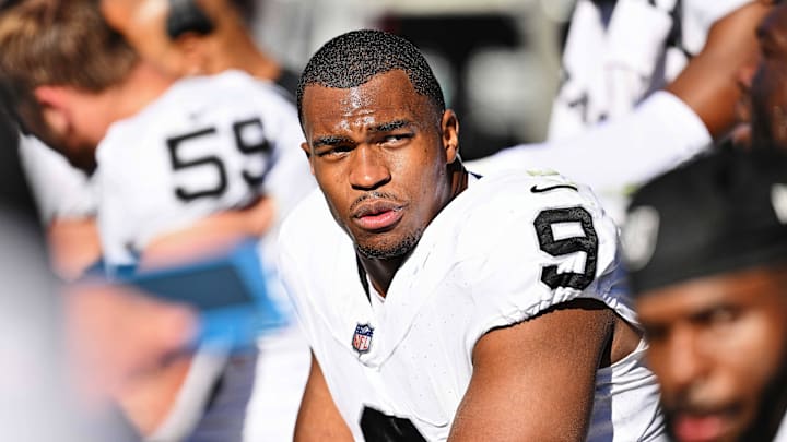 Oct 22, 2023; Chicago, Illinois, USA;  Las Vegas Raiders defensive end Tyree Wilson (9) takes a breather on the sidelines against the Chicago Bears at Soldier Field. Mandatory Credit: Jamie Sabau-Imagn Images