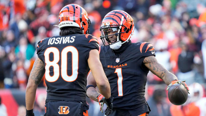 Cincinnati Bengals wide receiver Andrei Iosivas (80) and wide receiver Ja'Marr Chase (1) celebrate a Chase touchdown in the fourth quarter of the NFL Week 16 game between the Cincinnati Bengals and the Cleveland Browns at Paycor Stadium in downtown Cincinnati on Sunday, Dec. 22, 2024. The Bengals won 24-16.