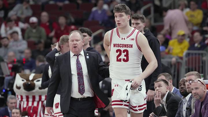 Mar 12, 2026; Chicago, IL, USA; Wisconsin Badgers head coach Greg Gard is shown with forward Will Garlock (23) during the first half of their third round game of the Big Ten tournament at United Center. Mandatory Credit: Mark Hoffman/USA Today Network via Imagn Images