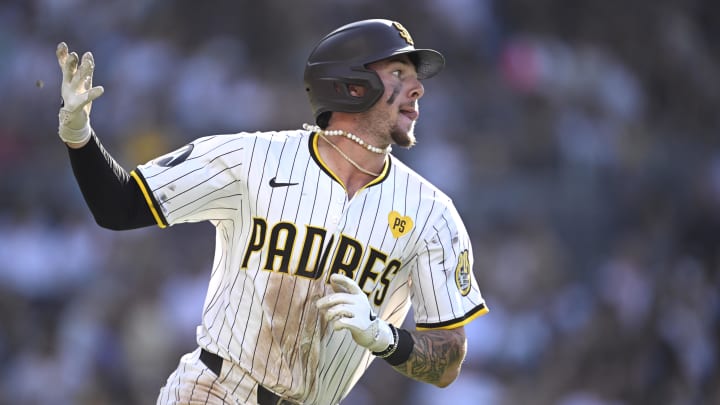 San Diego Padres center fielder Jackson Merrill hits a three-run home run against the Milwaukee Brewers at Petco Park.