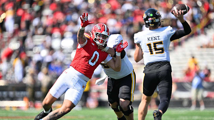 Sep 13, 2025; College Park, Maryland, USA; Maryland Terrapins linebacker Neeo Avery (0) pressures Towson Tigers quarterback Nathan Kent (15) in the second half at SECU Stadium. Mandatory Credit: Jamie Sabau-Imagn Images Sep 13, 2025; College Park, Maryland, USA; Maryland Terrapins linebacker Neeo Avery (0) pressures Towson Tigers quarterback Nathan Kent (15) in the second half at SECU Stadium. Mandatory Credit: Jamie Sabau-Imagn Images