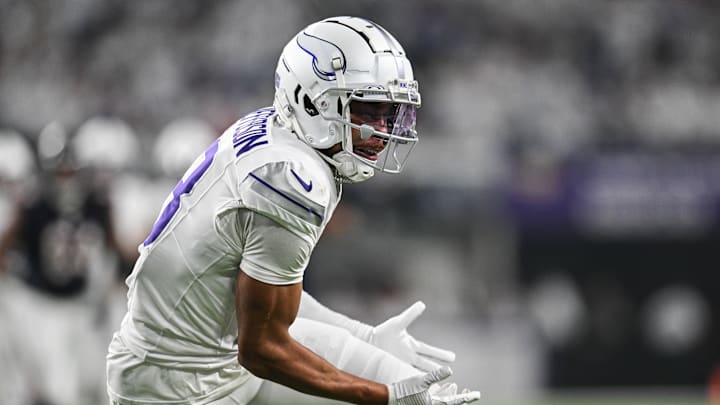 Dec 16, 2024; Minneapolis, Minnesota, USA; Minnesota Vikings wide receiver Justin Jefferson (18) reacts after dropping a pass against the Chicago Bears during the second quarter at U.S. Bank Stadium. Mandatory Credit: Jeffrey Becker-Imagn Images