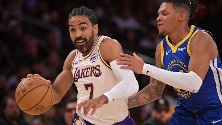 Oct 12, 2025; Los Angeles, California, USA; Los Angeles Lakers guard Gabe Vincent (7) drives past Golden State Warriors guard Will Richard (3) during the first half at Crypto.com Arena. Mandatory Credit: Jayne Kamin-Oncea-Imagn Images Oct 12, 2025; Los Angeles, California, USA; Los Angeles Lakers guard Gabe Vincent (7) drives past Golden State Warriors guard Will Richard (3) during the first half at Crypto.com Arena. Mandatory Credit: Jayne Kamin-Oncea-Imagn Images