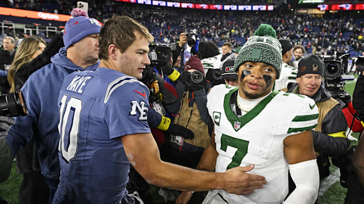 Nov 13, 2025; Foxborough, Massachusetts, USA; New England Patriots quarterback Drake Maye (10) and New York Jets quarterback Justin Fields (7) react after the game at Gillette Stadium. Mandatory Credit: Eric Canha-Imagn Images