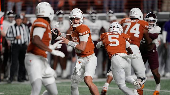 Nov 28, 2025; Austin, Texas, USA; Texas Longhorns quarterback Arch Manning throws a pass during the first half against the Texas A&M Aggies at Darrell K Royal-Texas Memorial Stadium. Mandatory Credit: Scott Wachter-Imagn Images
