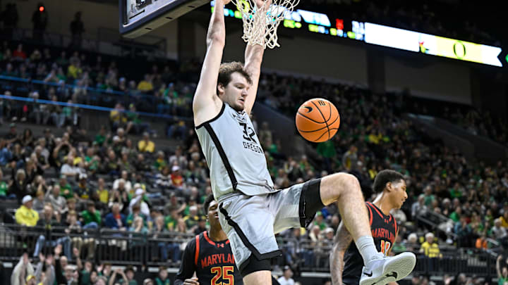 Jan 5, 2025; Eugene, Oregon, USA; Oregon Ducks center Nate Bittle (32) dunks the ball during the second half against the Maryland Terrapins at Matthew Knight Arena.