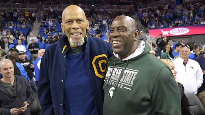 Feb 4, 2025; Los Angeles, California, USA; NBA Hall of Famer and UCLA Bruin alumni Kareem Abdul-Jabbar and NBA Hall of Famer and Michigan State Spartans alumni share a moment during the game between the two school at Pauley Pavilion presented by Wescom. Mandatory Credit: Jayne Kamin-Oncea-Imagn Images Feb 4, 2025; Los Angeles, California, USA; NBA Hall of Famer and UCLA Bruin alumni Kareem Abdul-Jabbar and NBA Hall of Famer and Michigan State Spartans alumni share a moment during the game between the two school at Pauley Pavilion presented by Wescom. Mandatory Credit: Jayne Kamin-Oncea-Imagn Images
