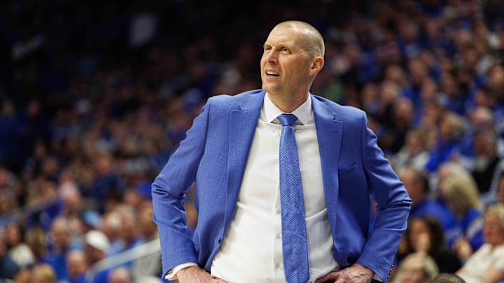 Dec 14, 2024; Lexington, Kentucky, USA; Kentucky Wildcats head coach Mark Pope looks on during the first half against the Louisville Cardinals at Rupp Arena at Central Bank Center. Mandatory Credit: Jordan Prather-Imagn Images Dec 14, 2024; Lexington, Kentucky, USA; Kentucky Wildcats head coach Mark Pope looks on during the first half against the Louisville Cardinals at Rupp Arena at Central Bank Center. Mandatory Credit: Jordan Prather-Imagn Images