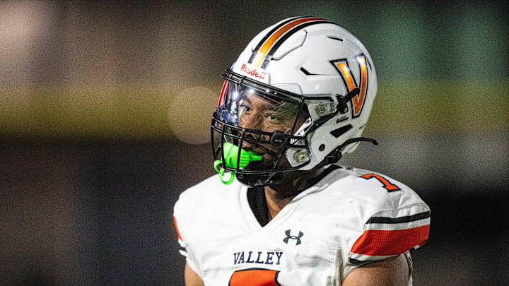 Valley's Jayden McGregory (7) looks to the Southeast Polk sideline after a stop on thrid down on Friday, Aug. 30, 2024, at Southeast Polk Stadium.
