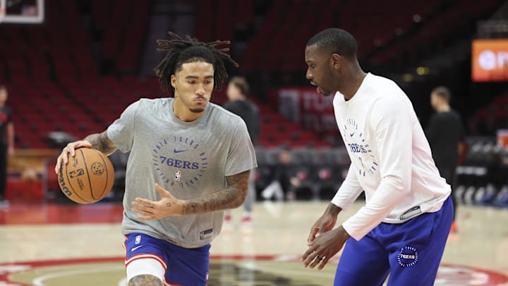 Mar 17, 2025; Houston, Texas, USA; Philadelphia 76ers guard Jalen Hood-Schifino (17) warms up before the game against the Houston Rockets at Toyota Center. Mandatory Credit: Troy Taormina-Imagn Images