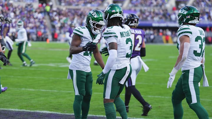 Nov 23, 2025; Baltimore, Maryland, USA; New York Jets wide reciever John Metchie III (3) celebrates with /j13/ after scoring a touchdown during the second quarter against the Baltimore Ravens at M&T Bank Stadium. Mandatory Credit: Mitch Stringer-Imagn Images