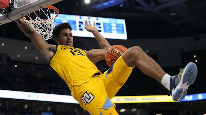 Jan 10, 2024; Milwaukee, Wisconsin, USA;  Marquette Golden Eagles forward Oso Ighodaro (13) dunks