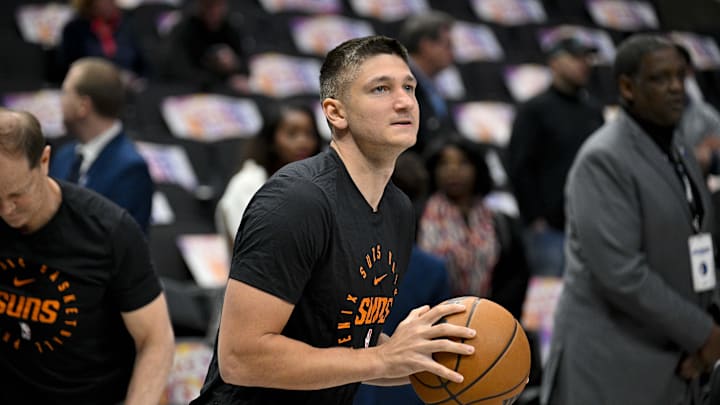 Mar 9, 2025; Dallas, Texas, USA; Phoenix Suns guard Grayson Allen (8) warms up before the game between the Dallas Mavericks and the Phoenix Suns at the American Airlines Center. Mandatory Credit: Jerome Miron-Imagn Images