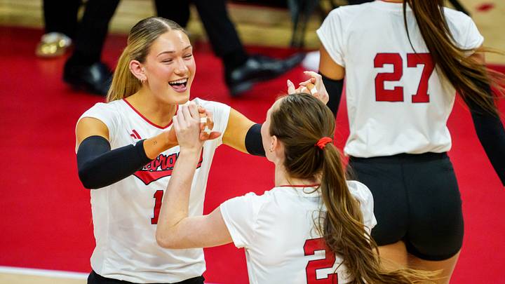 Nebraska Cornhuskers middle blocker Andi Jackson (15) and setter Bergen Reilly (2) greet on the court before a match. Mandatory Credit: Dylan Widger-Imagn Images Nebraska Cornhuskers middle blocker Andi Jackson (15) and setter Bergen Reilly (2) greet on the court before a match. Mandatory Credit: Dylan Widger-Imagn Images