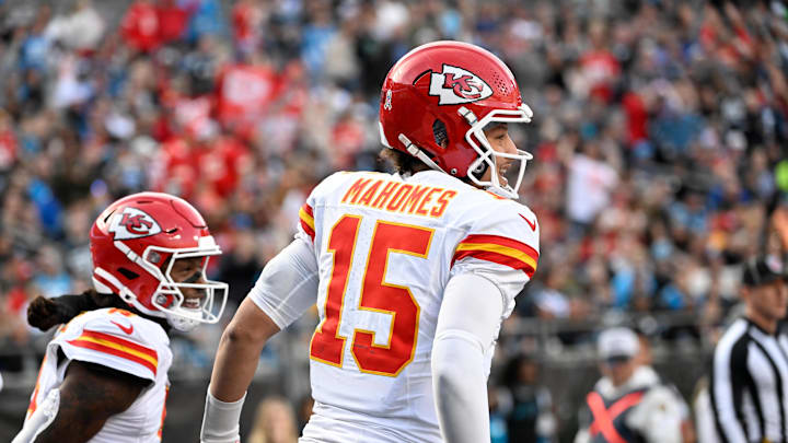 Nov 24, 2024; Charlotte, North Carolina, USA; Kansas City Chiefs wide receiver DeAndre Hopkins (8) celebrates with quarterback Patrick Mahomes (15) after scoring a touchdown in the third quarter at Bank of America Stadium. Mandatory Credit: Bob Donnan-Imagn Images