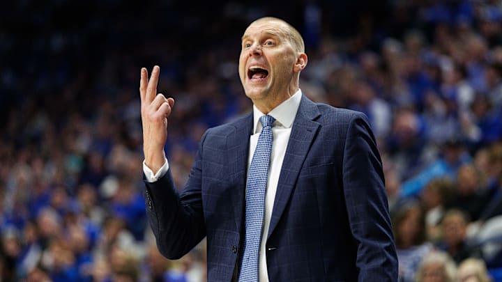 Dec 31, 2024; Lexington, Kentucky, USA; Kentucky Wildcats head coach Mark Pope calls out to his players during the first half against the Brown Bears at Rupp Arena at Central Bank Center. Mandatory Credit: Jordan Prather-Imagn Images