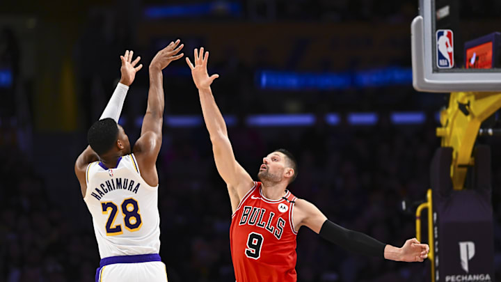 Mar 22, 2025; Los Angeles, California, USA; Los Angeles Lakers forward Rui Hachimura (28) shoots against Chicago Bulls center Nikola Vucevic (9) during the second half at Crypto.com Arena. Mandatory Credit: Jonathan Hui-Imagn Images Mar 22, 2025; Los Angeles, California, USA; Los Angeles Lakers forward Rui Hachimura (28) shoots against Chicago Bulls center Nikola Vucevic (9) during the second half at Crypto.com Arena. Mandatory Credit: Jonathan Hui-Imagn Images